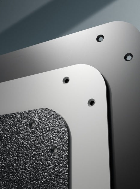 Drei strukturierte Pads für Fahrzeuge und Garagen, übereinander gestapelt, mit abgerundeten Ecken und Löchern.